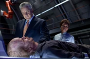 Robert Hammond and Amanda Waller examining Hector.