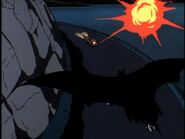 Batman pursues a robotic thief.