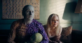 Metamorpho's family watch the news