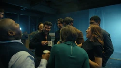 McCoy laughs with the team and 