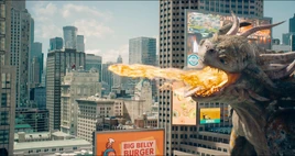 Kaiju attacks Superman with a fire breath