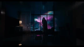 Superman and Lois hug at night