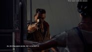 Ryder pointing his pistol at Jin