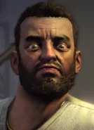 A headshot of Thaddeus