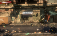 The electronics store, south of the police station