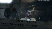 Ryder White standing to attention behind Charon as he talks to the heroes