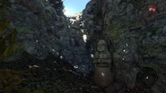 The passageway around to the back of the cave and the arena