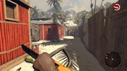 Holding the chainsaw