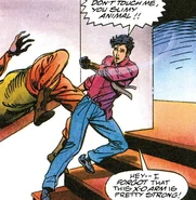 Ken using his metallic arm for melee.