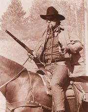 Rooster Cogburn with his Model 1894 and his Colt Peacemaker