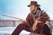 The Man cuddling his precious Henry rifle (this pic is the non-scoped version in For a Few Dollars More.