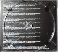 Back Of The CD. (Behind The CD).