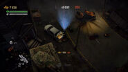 The player collecting loot from a vehicle.