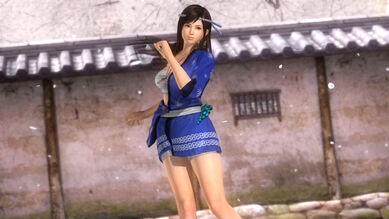 Kokoro: Short blue happi with one sleeve off, a white strapless bra and white shorts underneath, a tied blue headband, white ankle socks and brown sandals with blue straps.