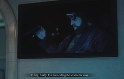 Teddy talks to Nick on the TV screen.