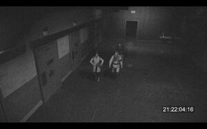 Fonata, James Caballero and Dr. Blackburne in a security feed during Case 0.