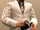 White Business Suit and Striped Tie