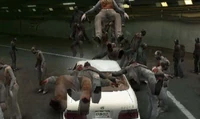 White sedan ownage.jpg (59 KB) Running over zombies.