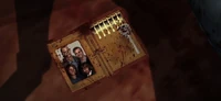 Cliff's wallet, containing a family photograph.