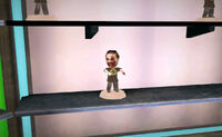 Dead rising bobble head in green kiosk