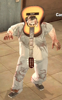 Guitar on zombie's head
