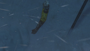 The arm of Santos' corpse after the fall in Chapter 13.