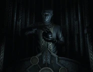 A statue of Michael Altman in the Titan Station Church of Unitology.