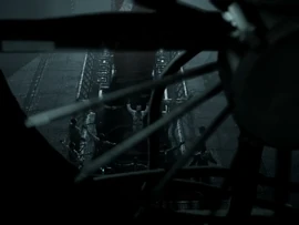 Mercer leads a group of Unitologists in prayer in front of the Marker.