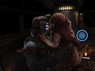 Karrie Norton facing off against a Lurker in Dead Space (mobile).