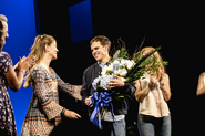 Taylor Trensch receiving flowers on his opening night.