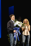 Taylor Trensch receiving flowers on his opening night.