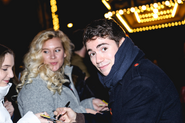 Noah Galvin signing playbills on his opening night.