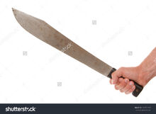 Stock-photo-man-holding-a-machete-isolated-on-white-104712539.jpg