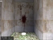 The blood splatter in the surface level in the beta version. Notice how there is the gasoline on the floor instead of a file and a battery.