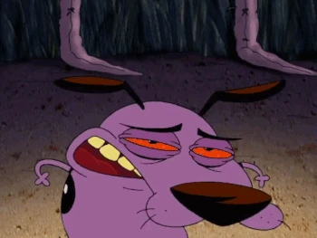 Courage laying an egg