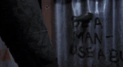 Roy Burns stabs through a metal outhouse.