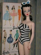 The first Barbie doll (introduced in both blonde and brunette)