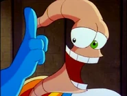 Earthworm Jim as he appears in the animated television series adaption from Universal Cartoon Studios.