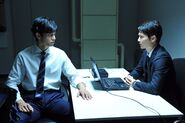 Touta Matsuda giving a polygraph test to Tsukuru Mishima