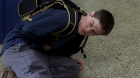 Adam betraying Fitz by punching him in the stomach.