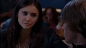 Peter and Mia bond at his party.