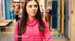 Zoë as she is approached by Becky.