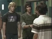 Nic (center) confronting J.T
