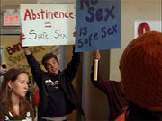 Spinner protesting Marco's safe sex campaign.