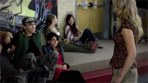 Johnny tells Emma about Darcy's flirtations with Archie while Darcy is on the sidelines.