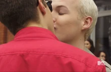 Miles and Tristan kiss in front of the school