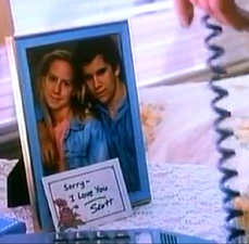 Scott's present to apologize to Kathleen.