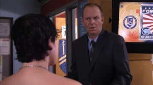 A naked Eli approaches Archie.