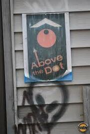 Above the Dot sign