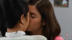 Zoë and Esme kissing